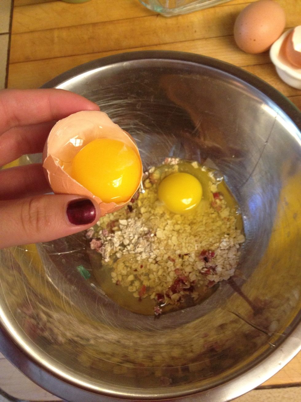 Add oatmeal, whole egg, and then separate 2 egg whites.