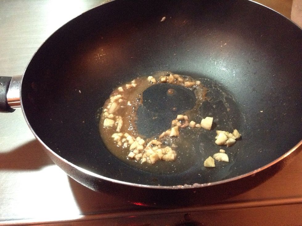 Add oil, garlic and ginger.