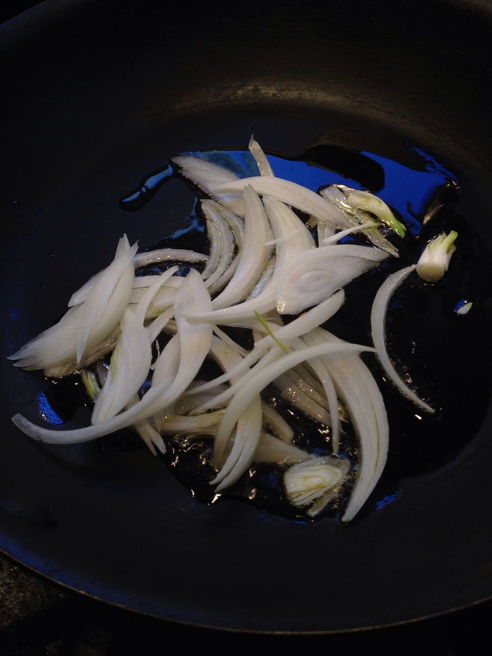 Add oil in a medium skillet over low-medium heat, then saute onions until they begin to turn translucent