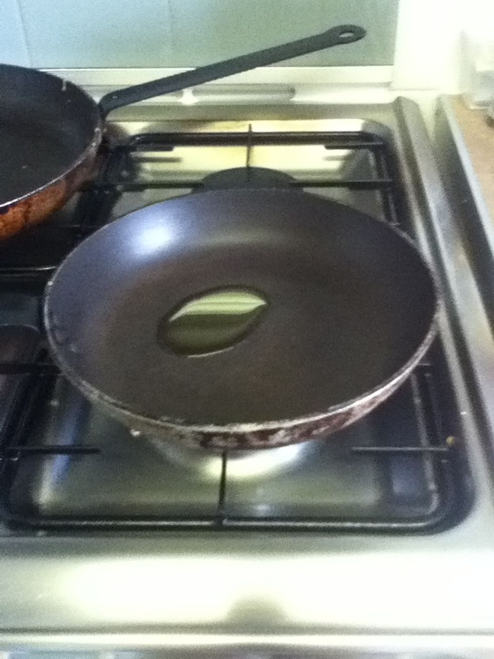 Add oil or butter to a pan and heat