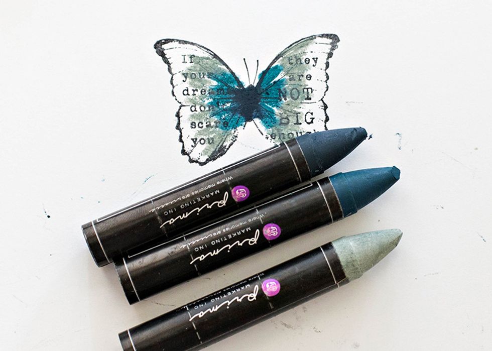 Add Oil Pastels to the stamp (darkest in the center working outwards to the lightest.) Blend with your finger again.