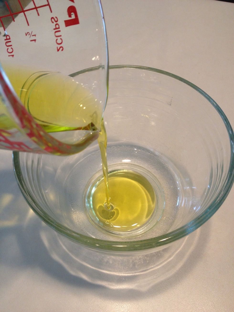 Add oil to a small mixing bowl.