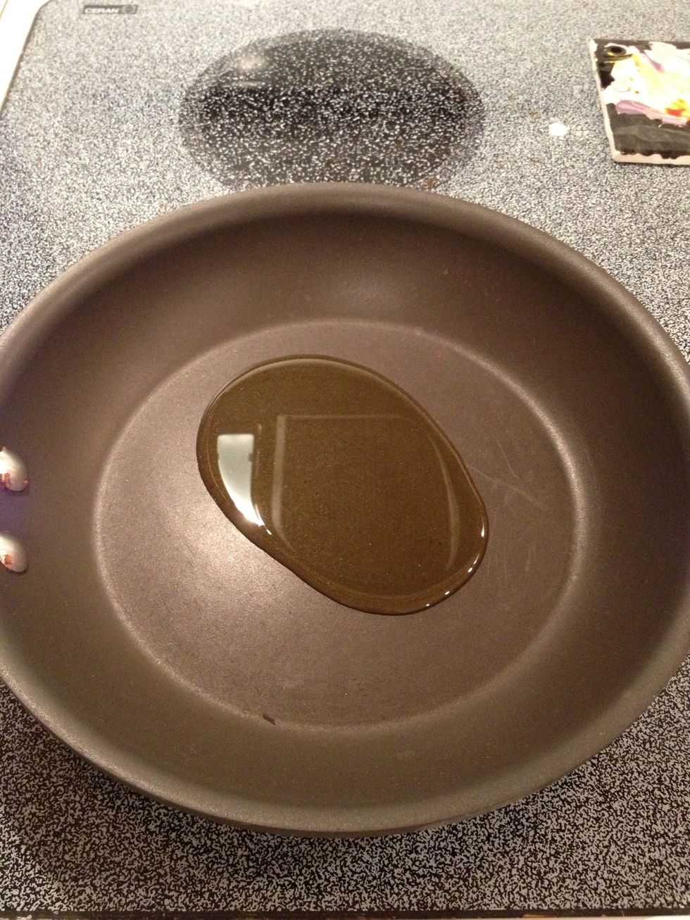 Add oil to large pan and heat over medium heat.