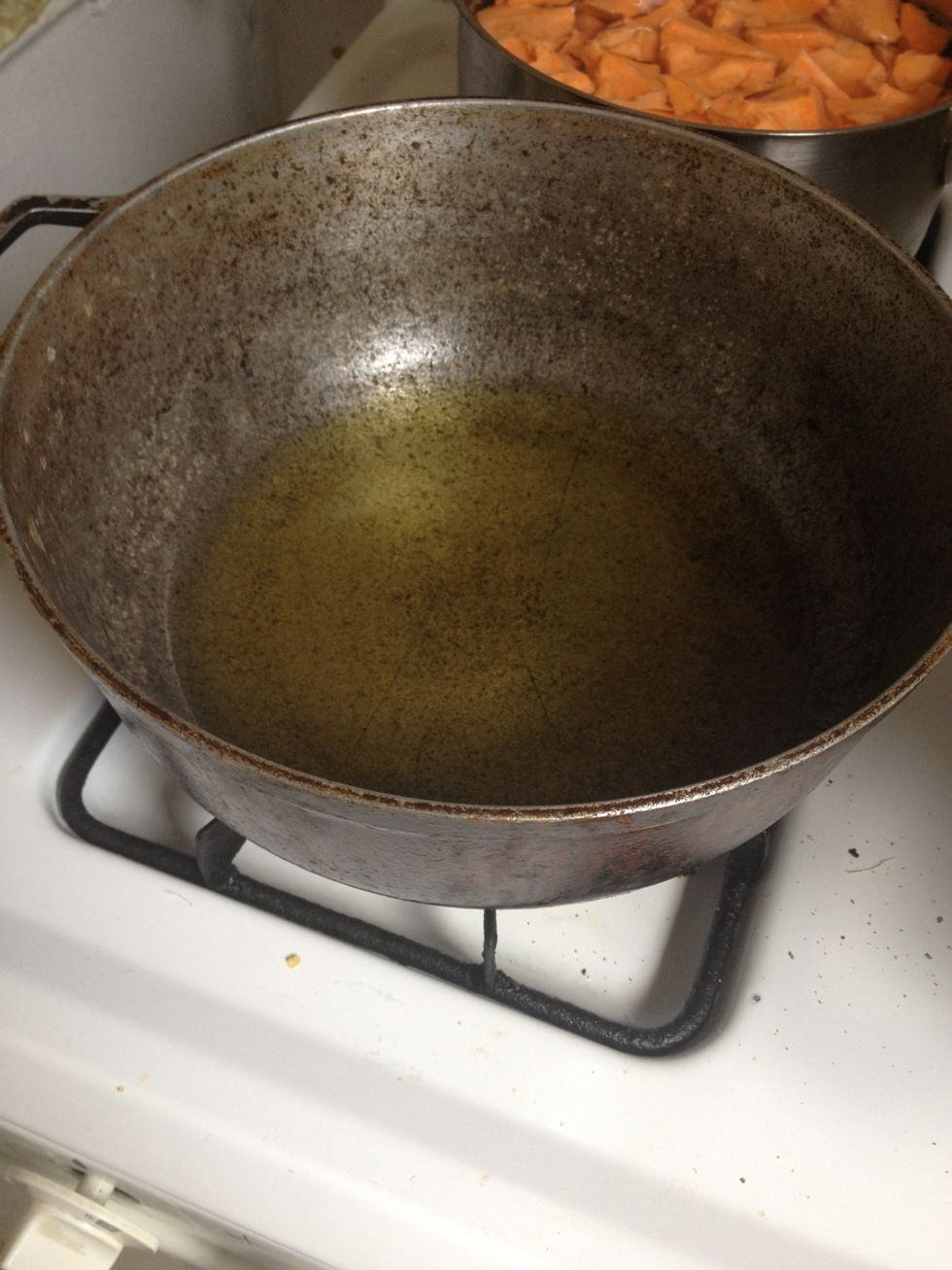 Add oil to pot and under high heat for 2 minutes.