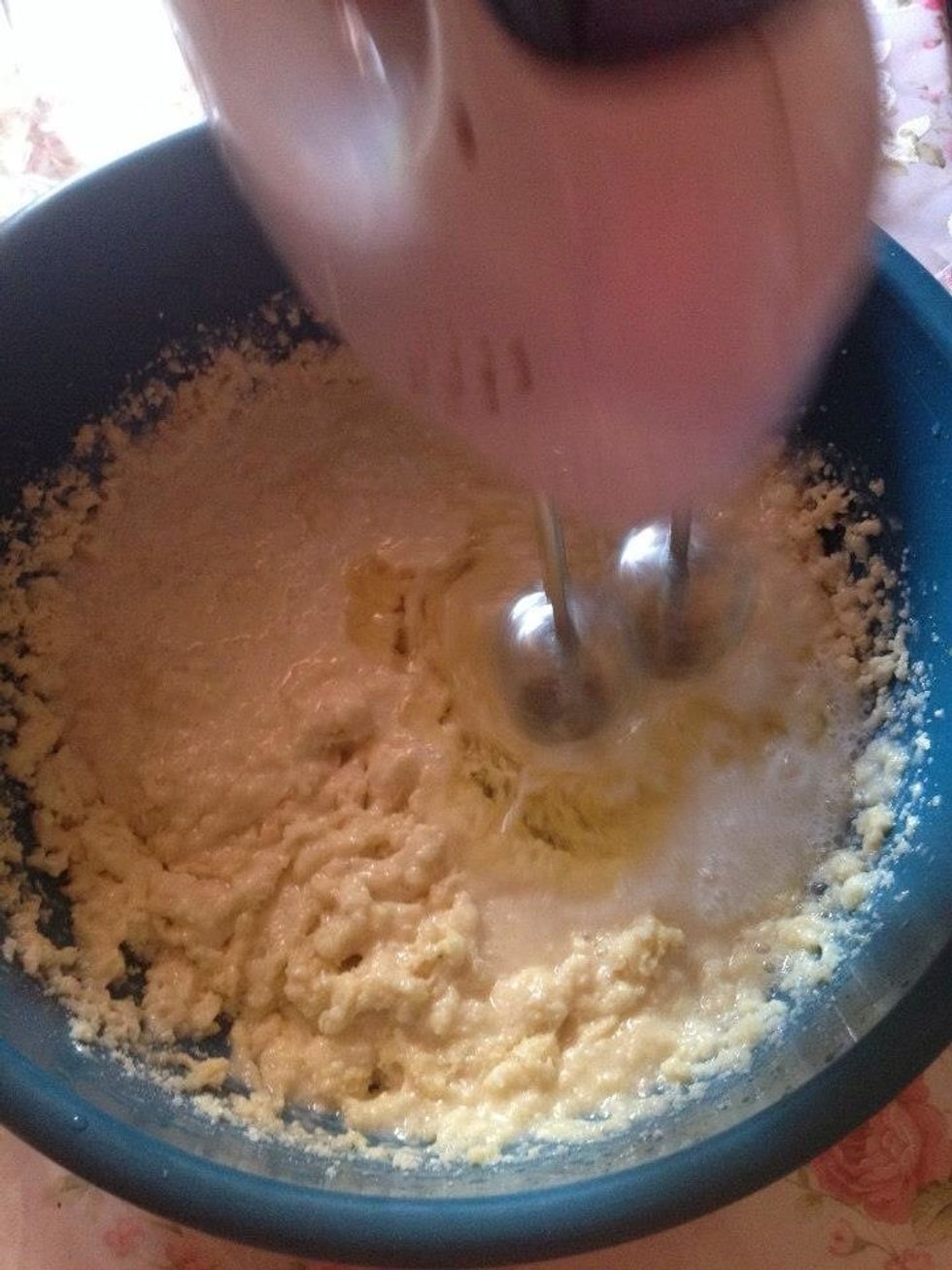 Add oil ,water and continued stirring until the mixture becomes a coherent