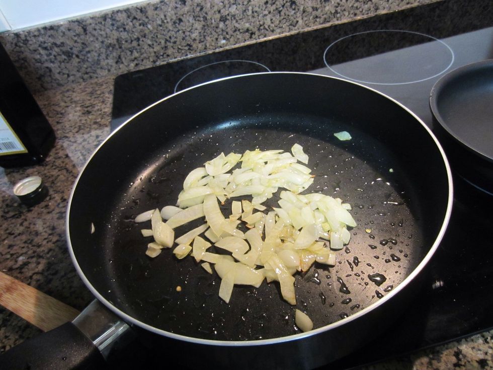 Add olive oil and onions to pan or wok if you have one. Cook on medium heat