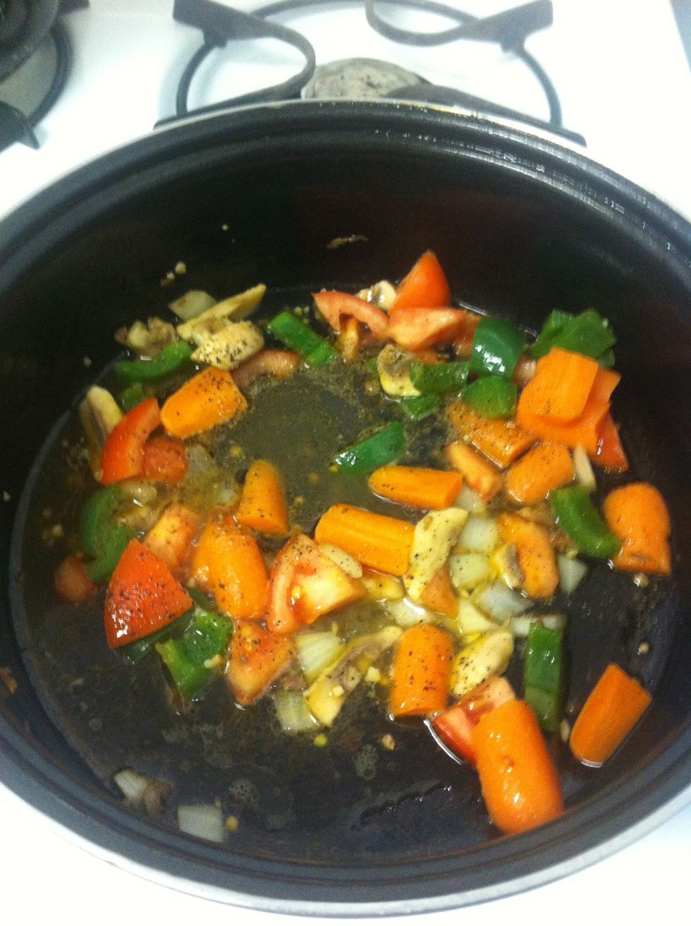 Add olive oil, garlic, vegetables and stock in the pan. Cook until veggies are tender.