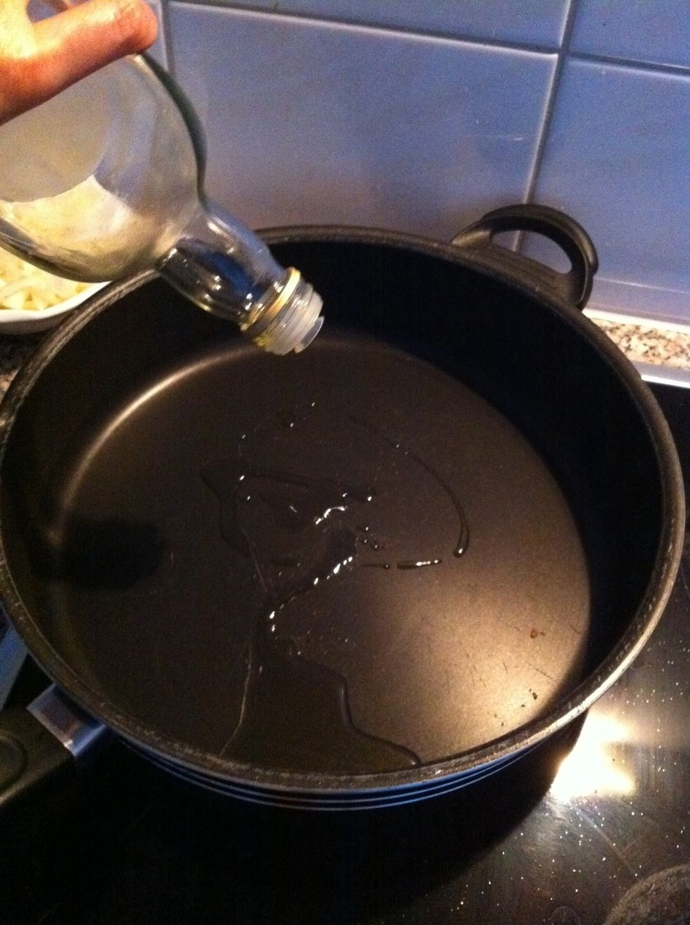 Add olive oil into hot pan.