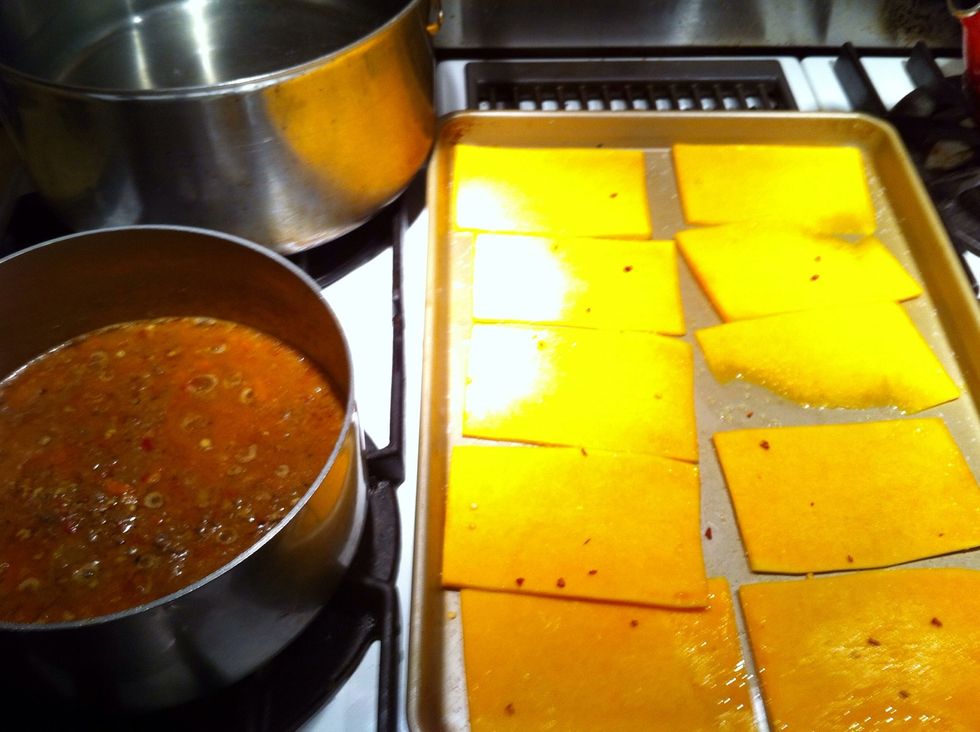 Add olive oil, salt, crushed RP to Butternut planks. Roast at 400...for 10 min. Add leftover Bolognese to pan and reheat with 1/2 cup or so water and simmer back to goodness :-D