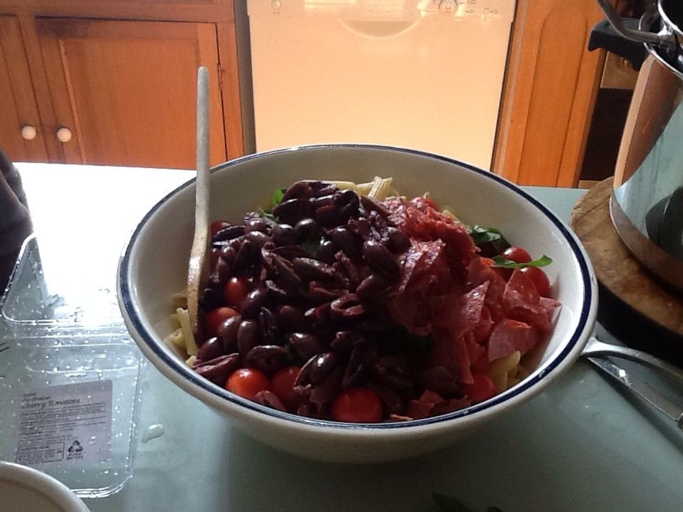 Add olives to the pasta