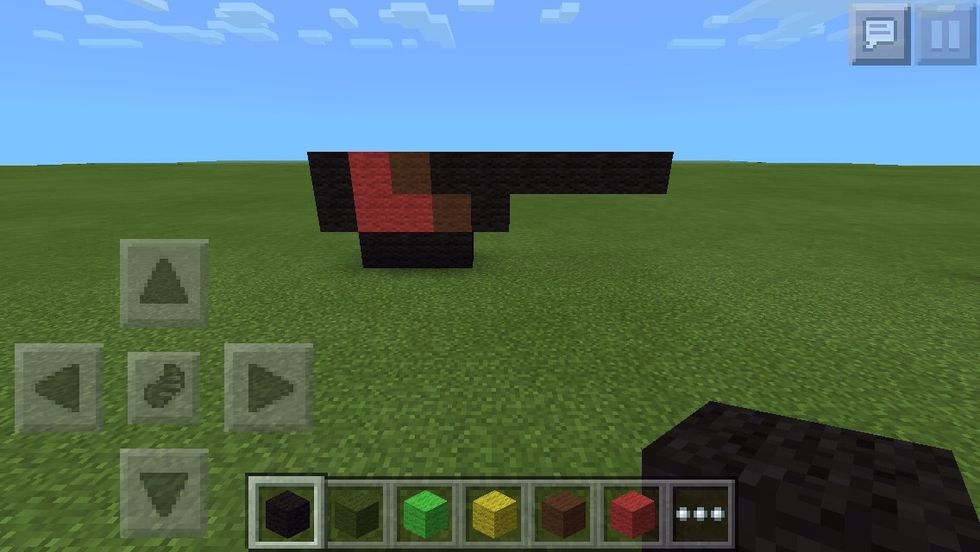 Add one black beside the lower brown, and by the upper brown, add six blacks across.