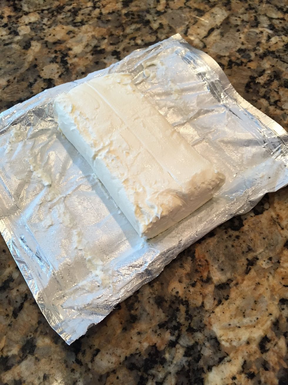Add one brick of cream cheese into the warm custard