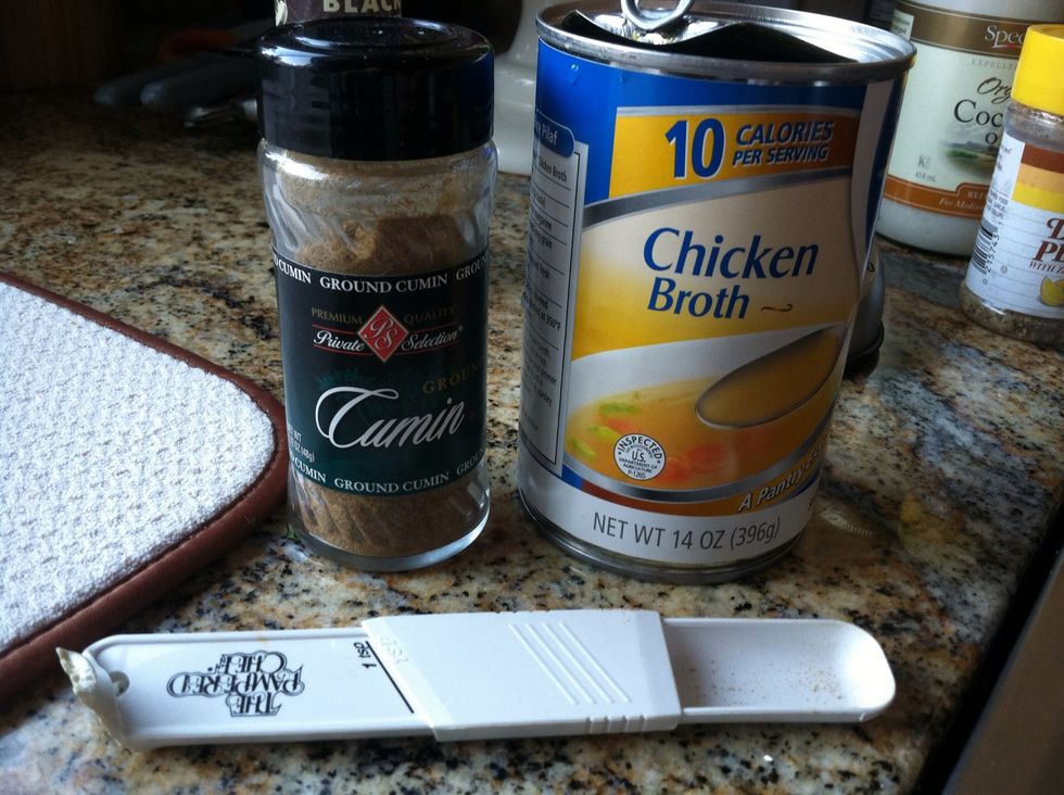 Add one cup chicken broth and two tsp cumin to a sauce pan over medium heat.
