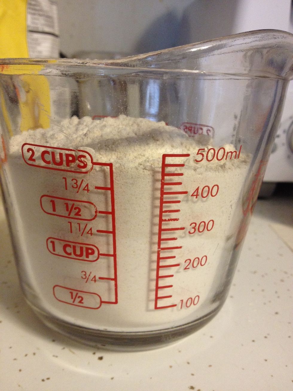Add one cup of wheat flour and one cup of white flour.