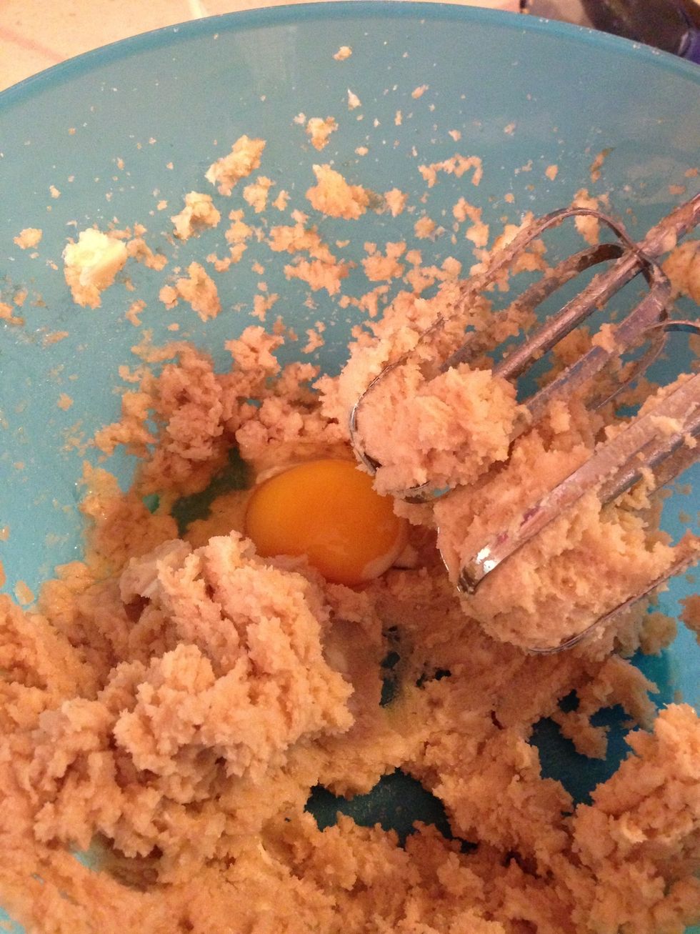 Add one egg at a time and blend in with mixer