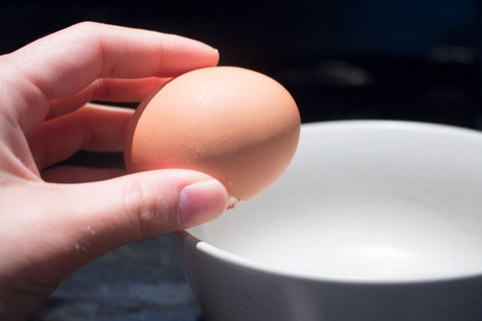 Add one egg to the peanut butter mixture