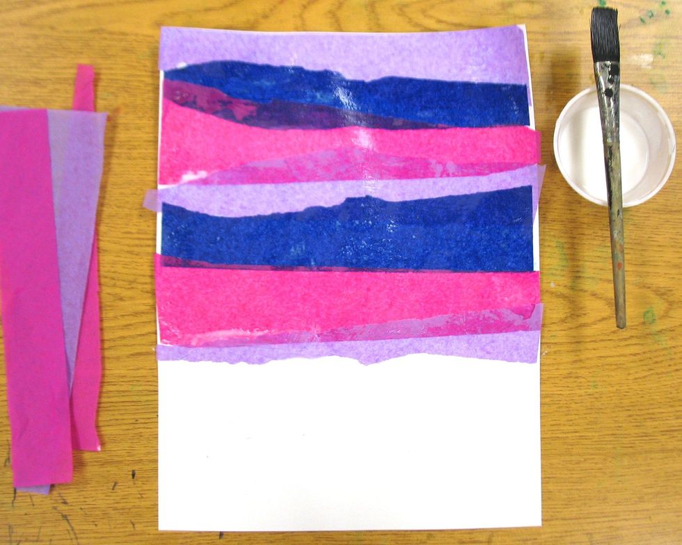Add one final strip of tissue paper that is the same color as the first. Try to find a piece that has a somewhat jagged edge. At this point, about 1/3 of the paper should be white.