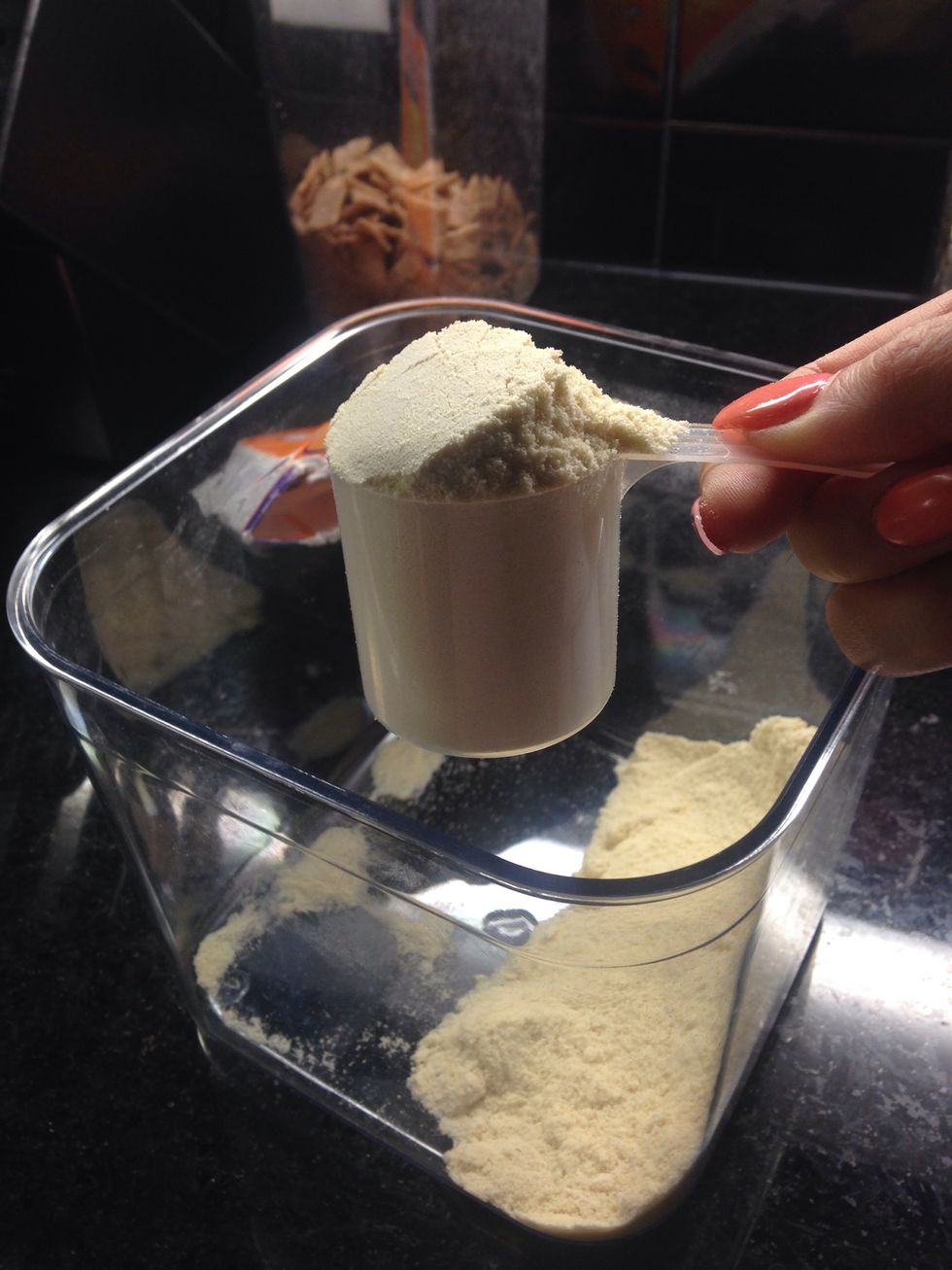 Add one heaping scoop of your favourite whey protein. Today i used banana flavour.