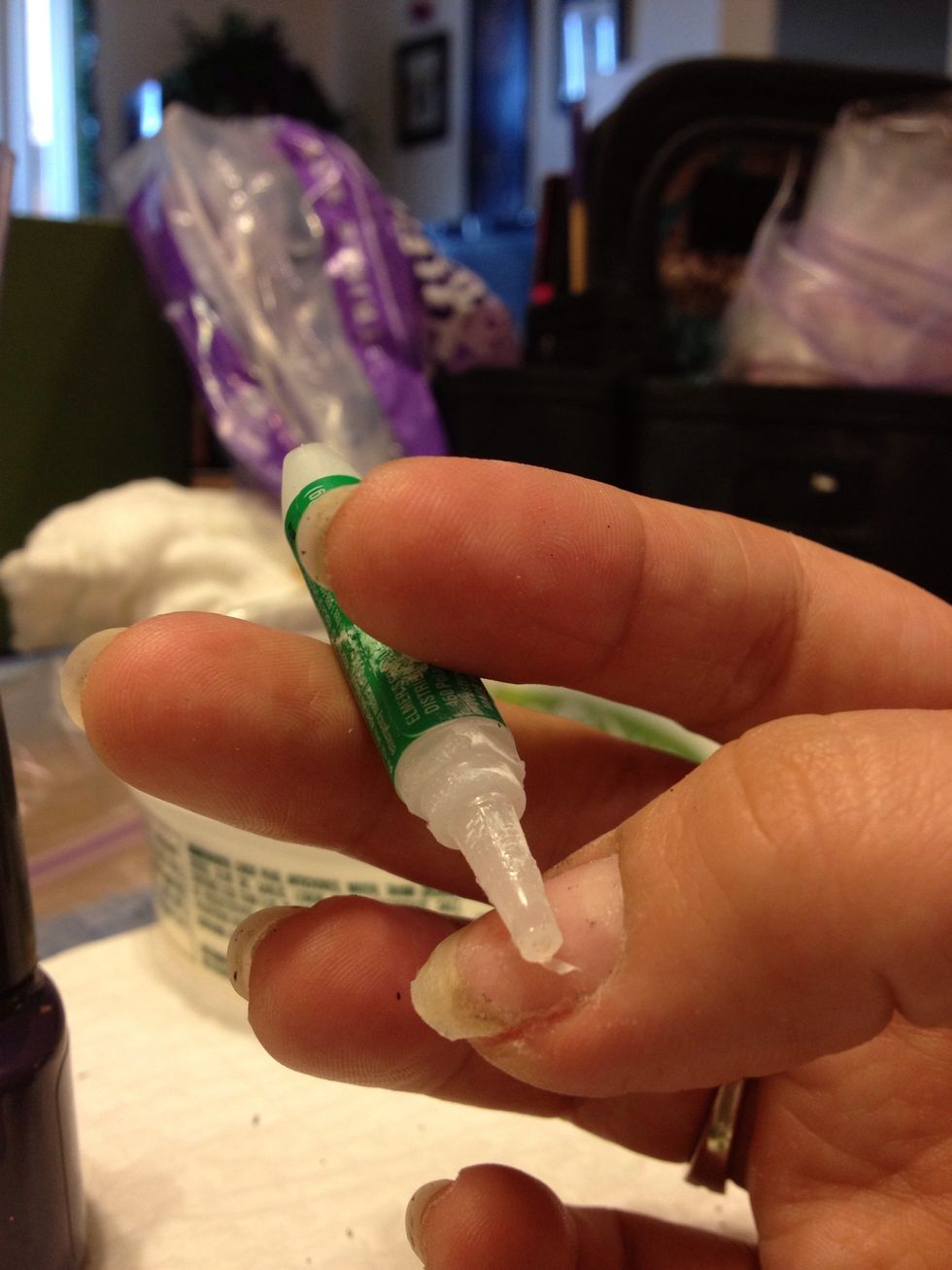 Add one more layer of glue to the nail.