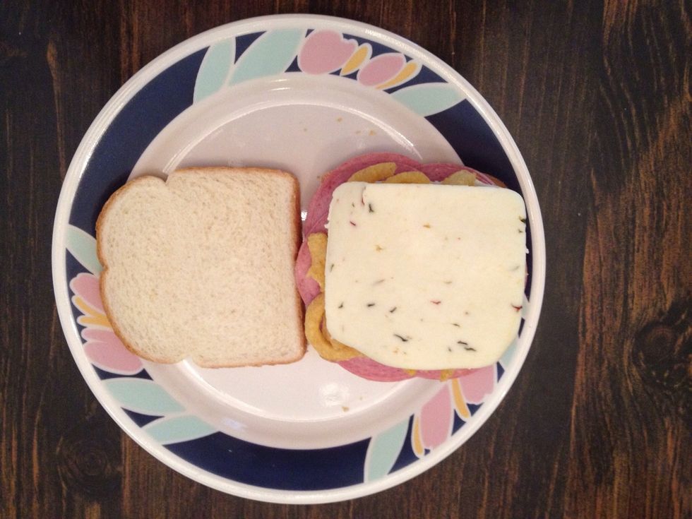 Add one more slice of pepper jack cheese...