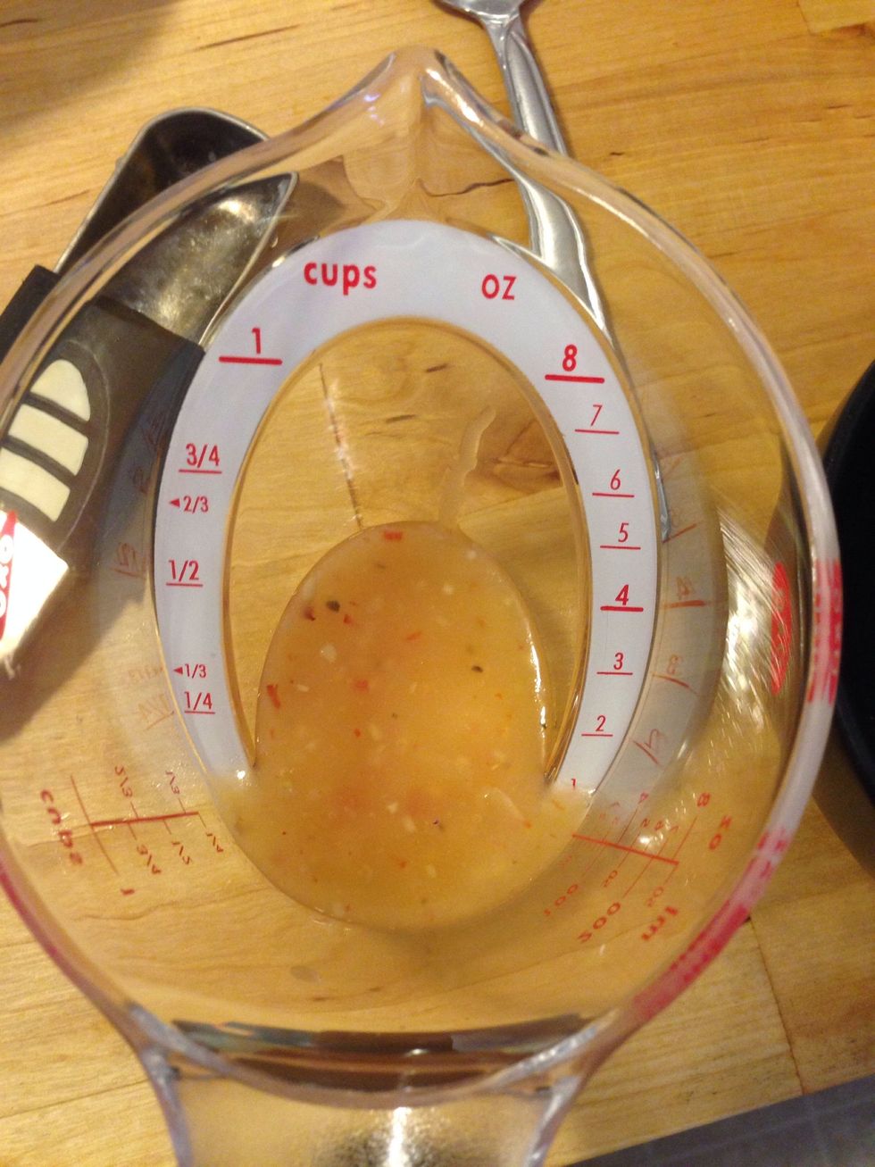 Add one ounce of Italian dressing to a bowl.