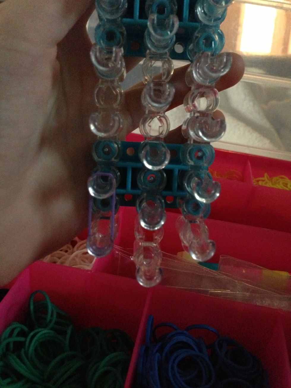 Add one rubber band on the far left two pegs \ud83d\ude04