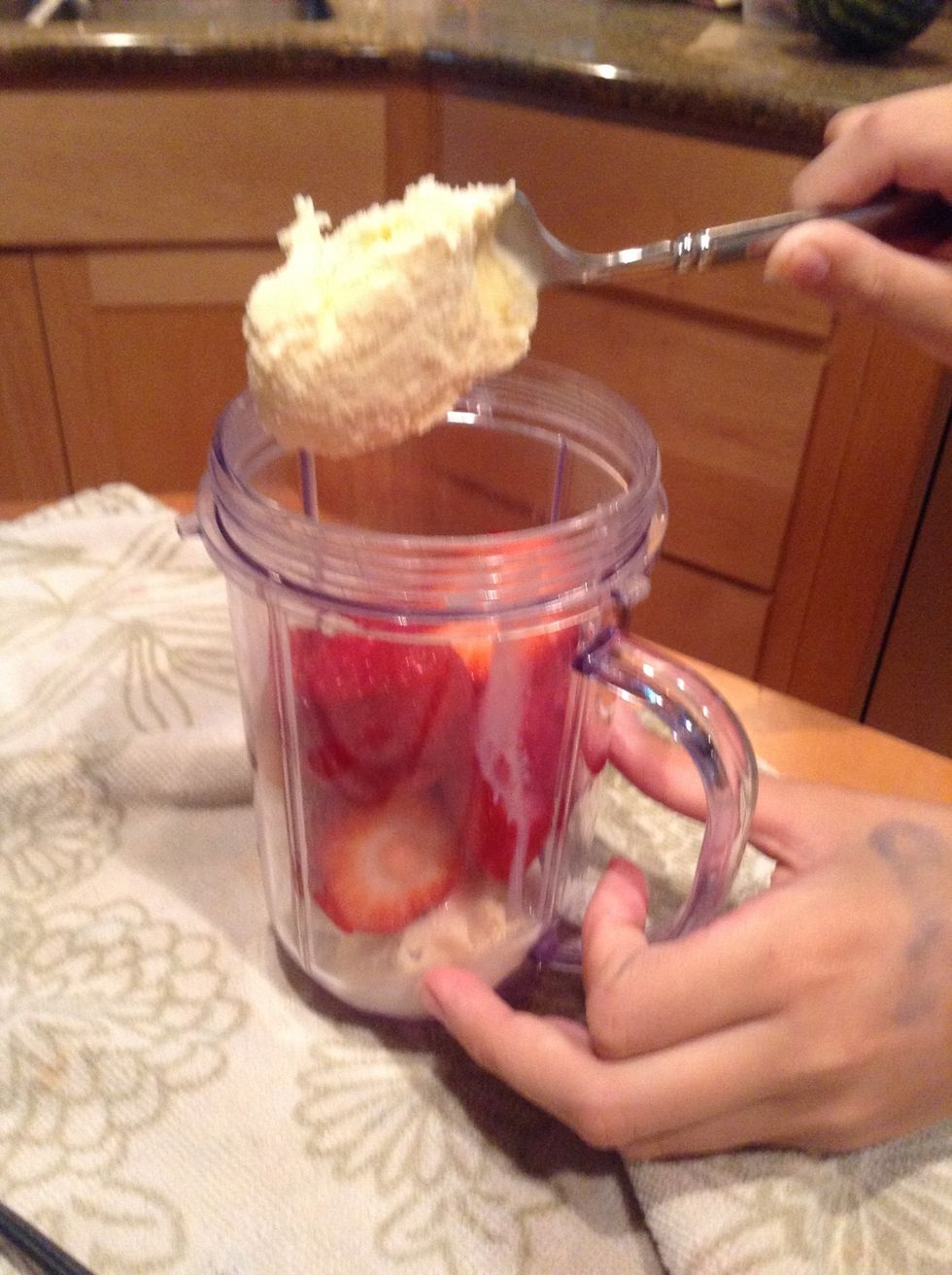 Add one scoop of ice cream at the top
