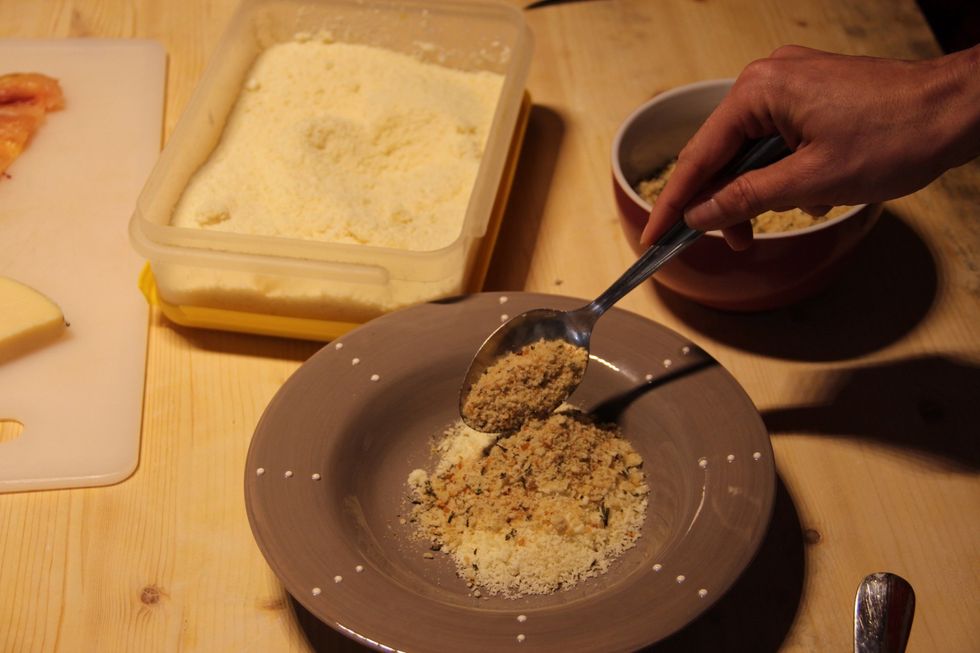 Add one spoon of breadcrumbs and one of parmesan cheese