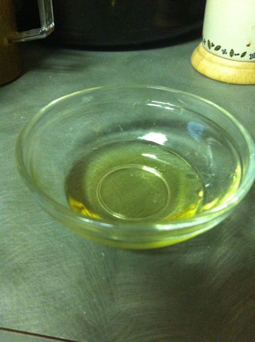Add one tablespoon of olive oil; just enough to coat it and give it a nice flavor while cooking it.