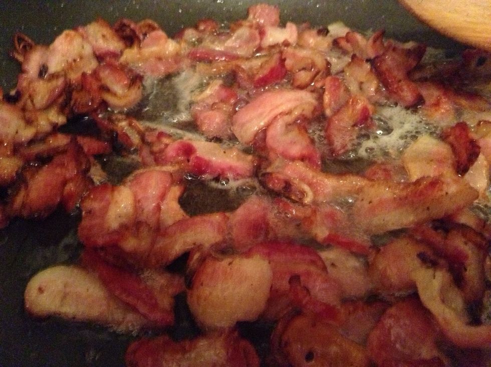 Add onion after bacon is halfway cooked so it doesn't burn (like mine did!); or, as I said, you could even forget the onion if you're a real purist!