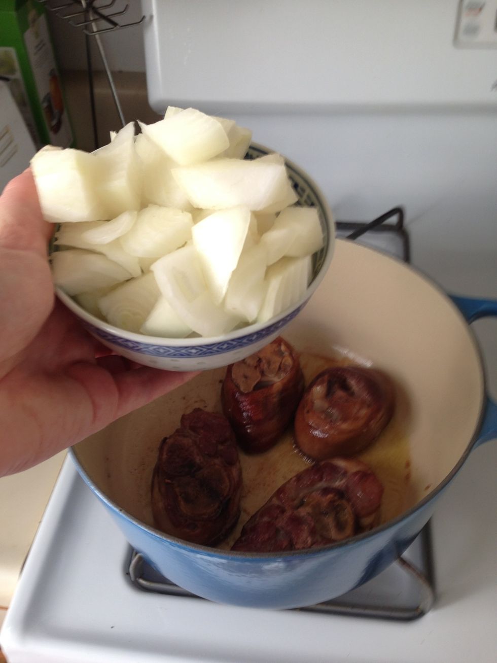 Add onion and cook until slightly translucent (also around 4 minutes). If you're veganizing it, add a tbsp of smoked paprika now.