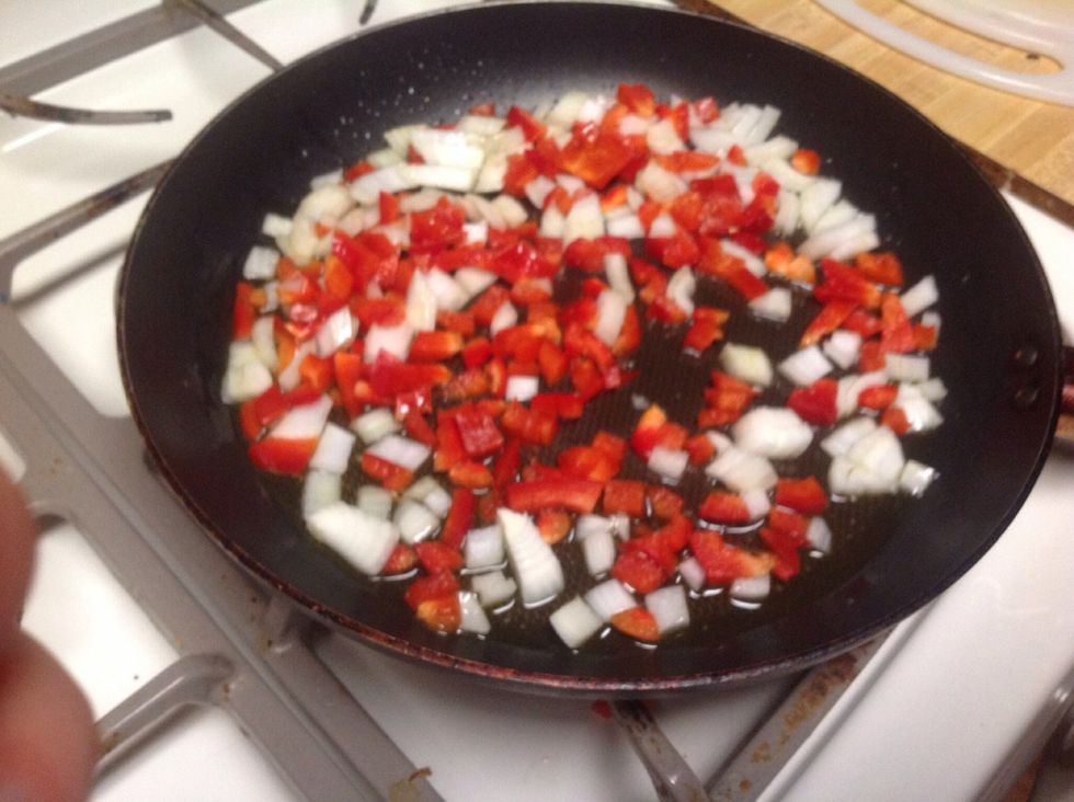 add onion and red bell pepper! cook until tender