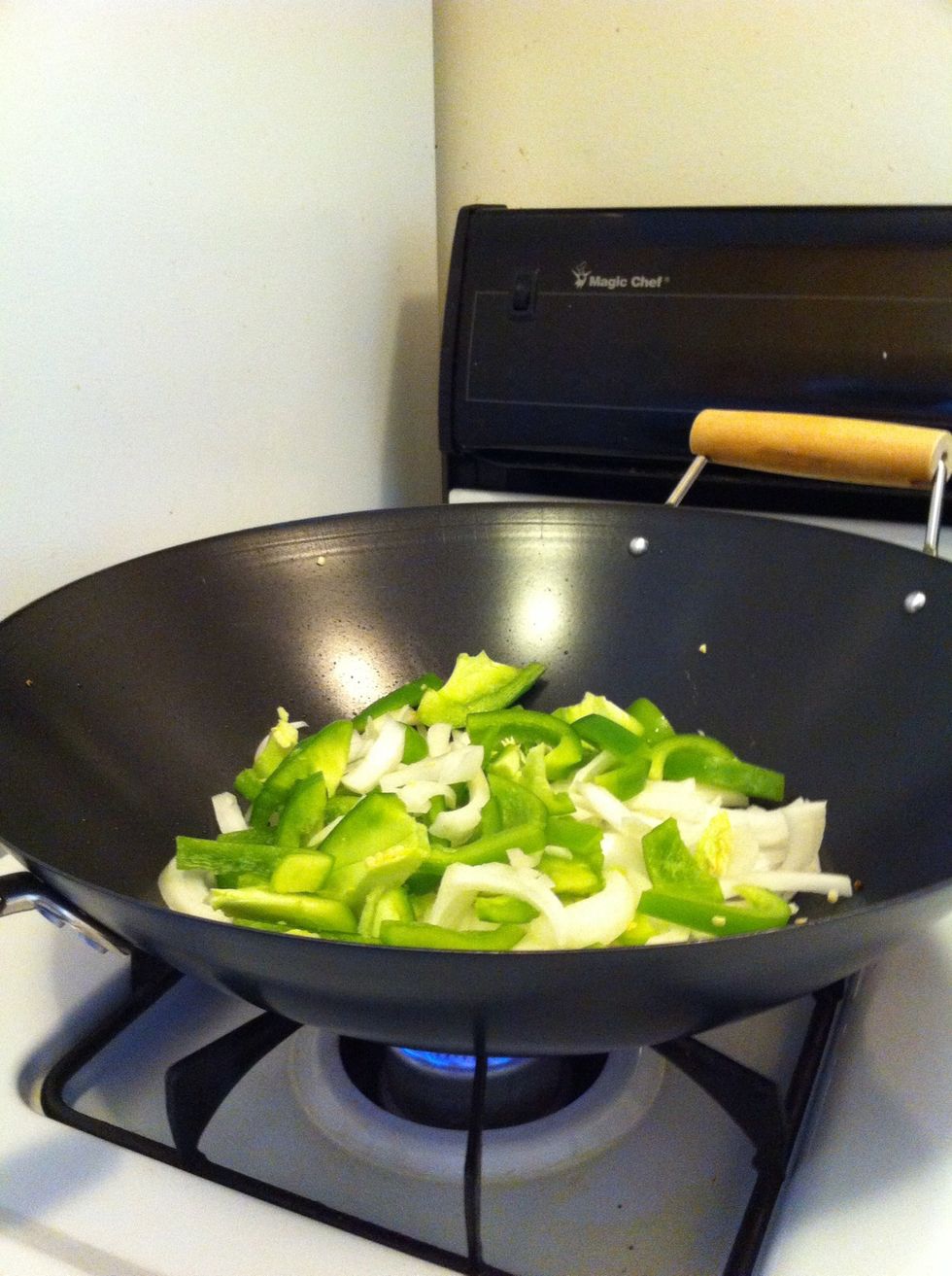 Add onion & bell pepper, add some salt to it (it helps to cook fast \ud83d\ude1c)