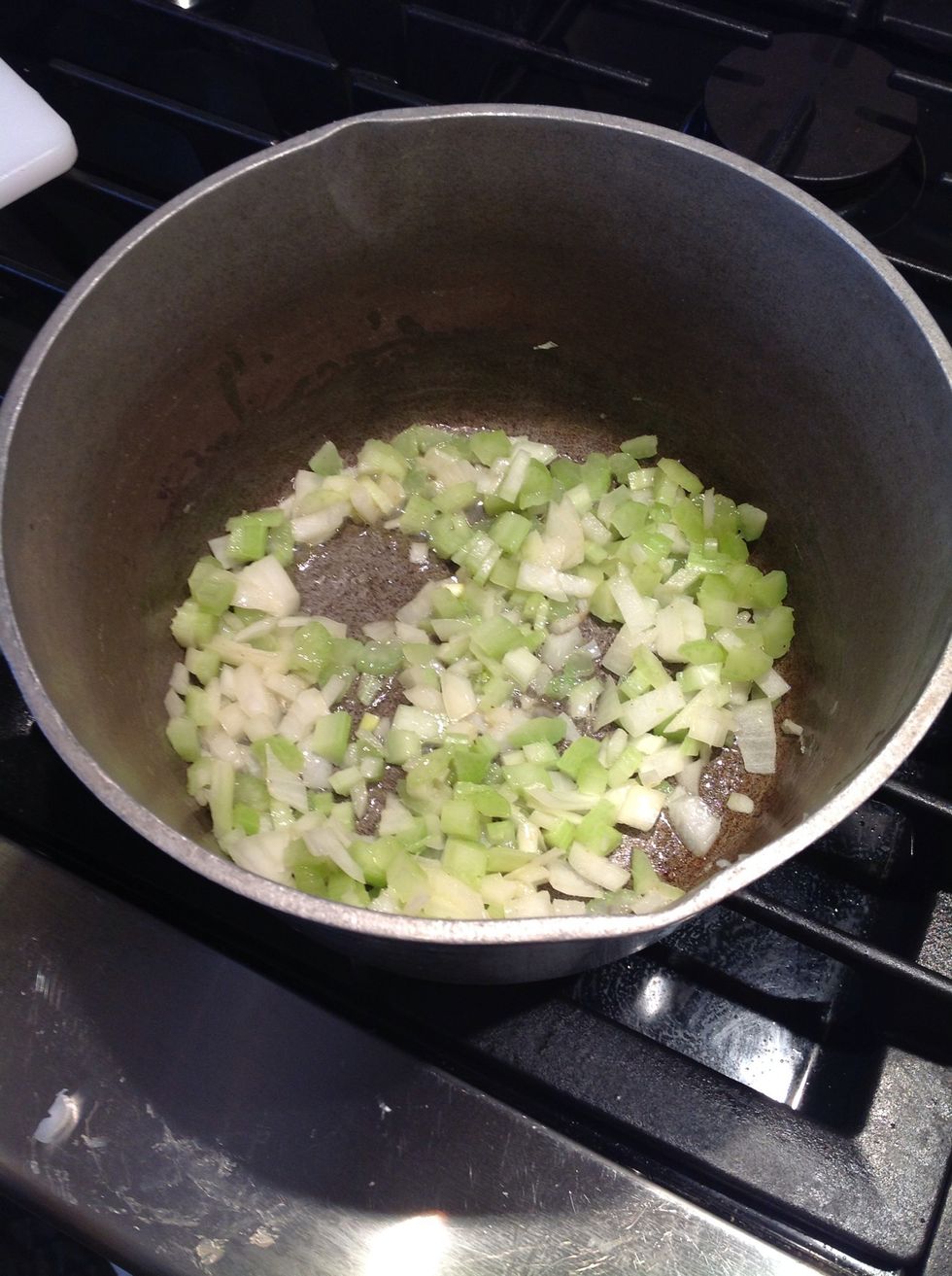 Add onion, celery and saut\u00e9 for about 2 minutes. Add garlic then so it doesn't burn.