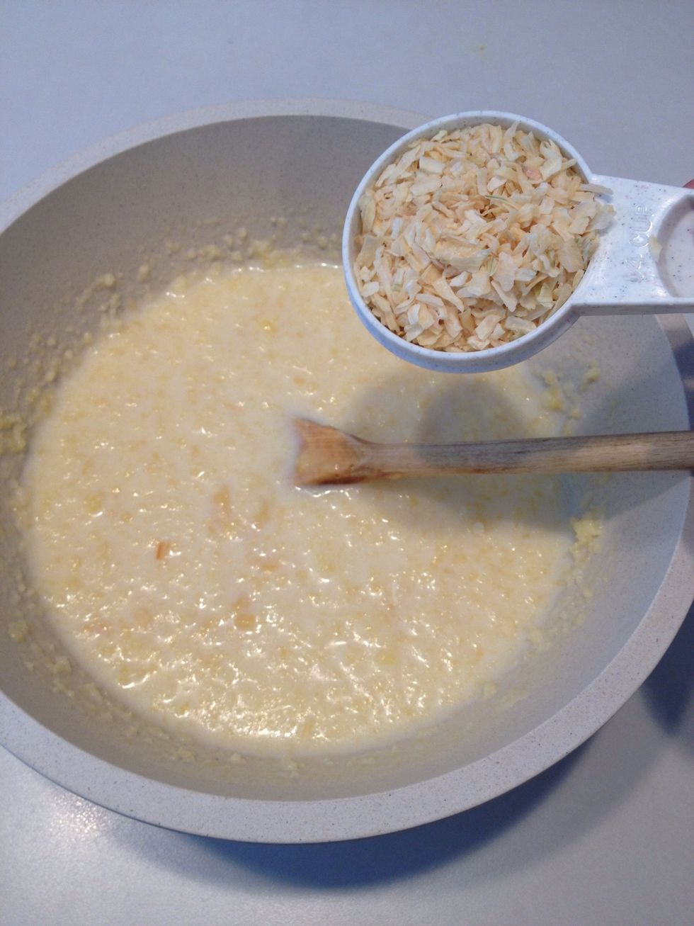Add onion flakes. Stir.