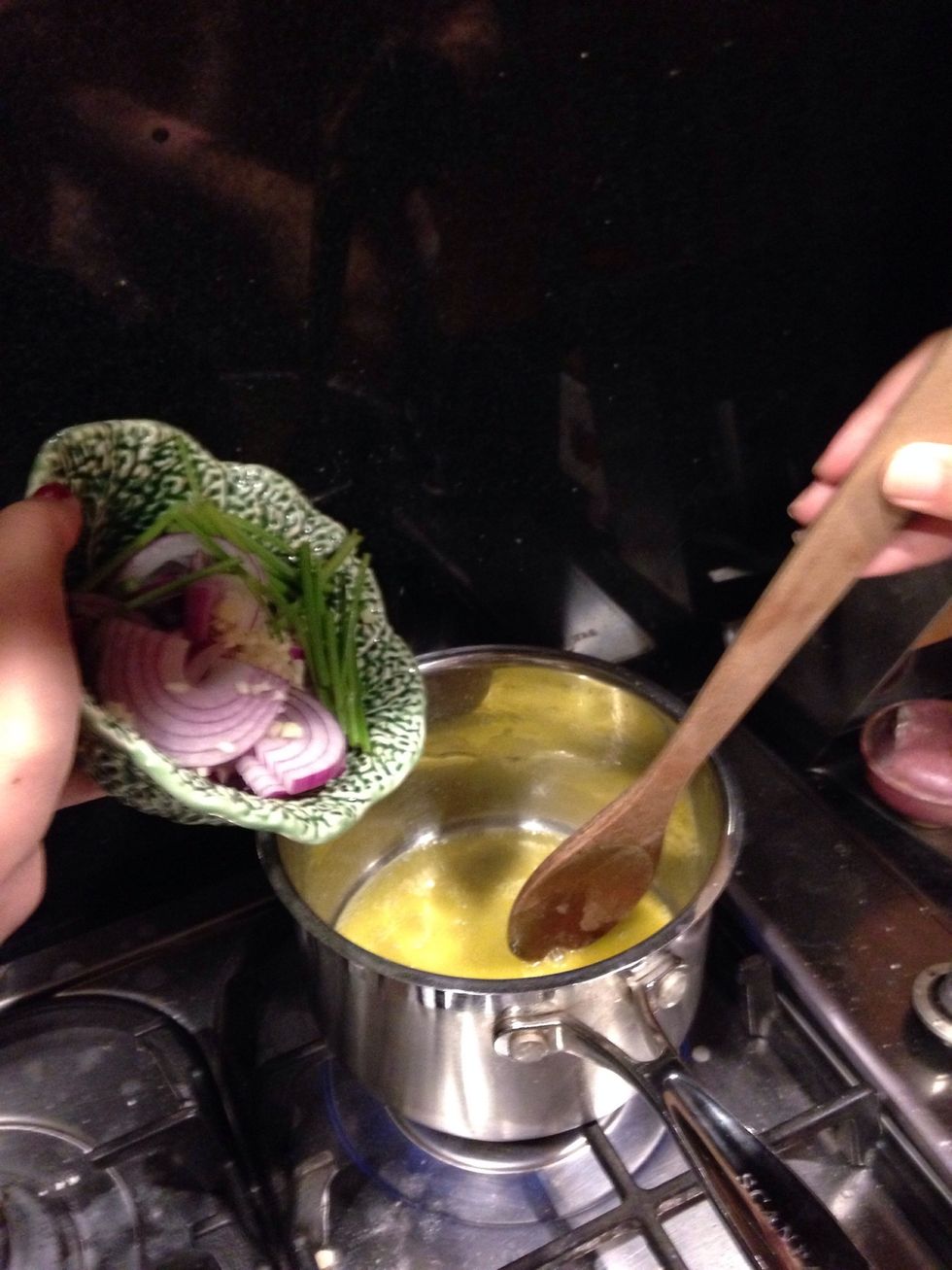 Add onion, garlic and parsley stalks