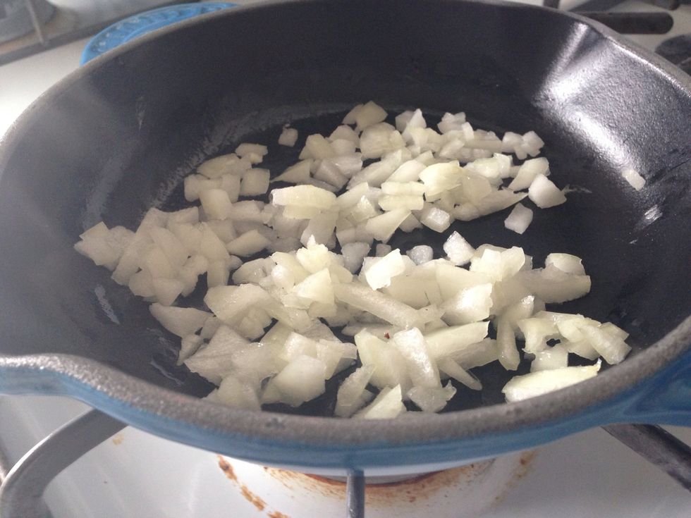 Add onion to skillet w 1tbsp olive oil. Cook until slightly browned and translucent.