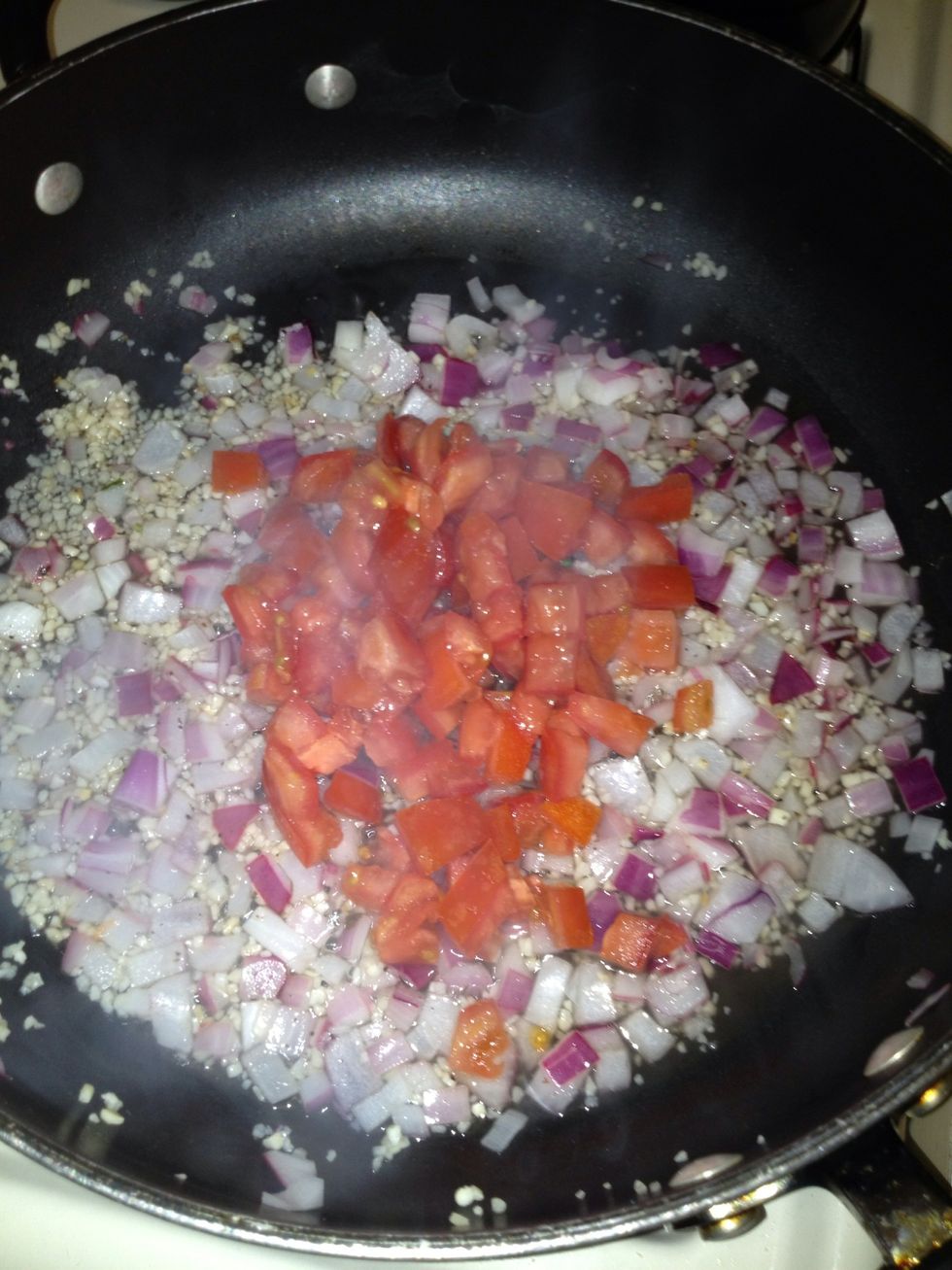 Add onion tomato and salt and pepper