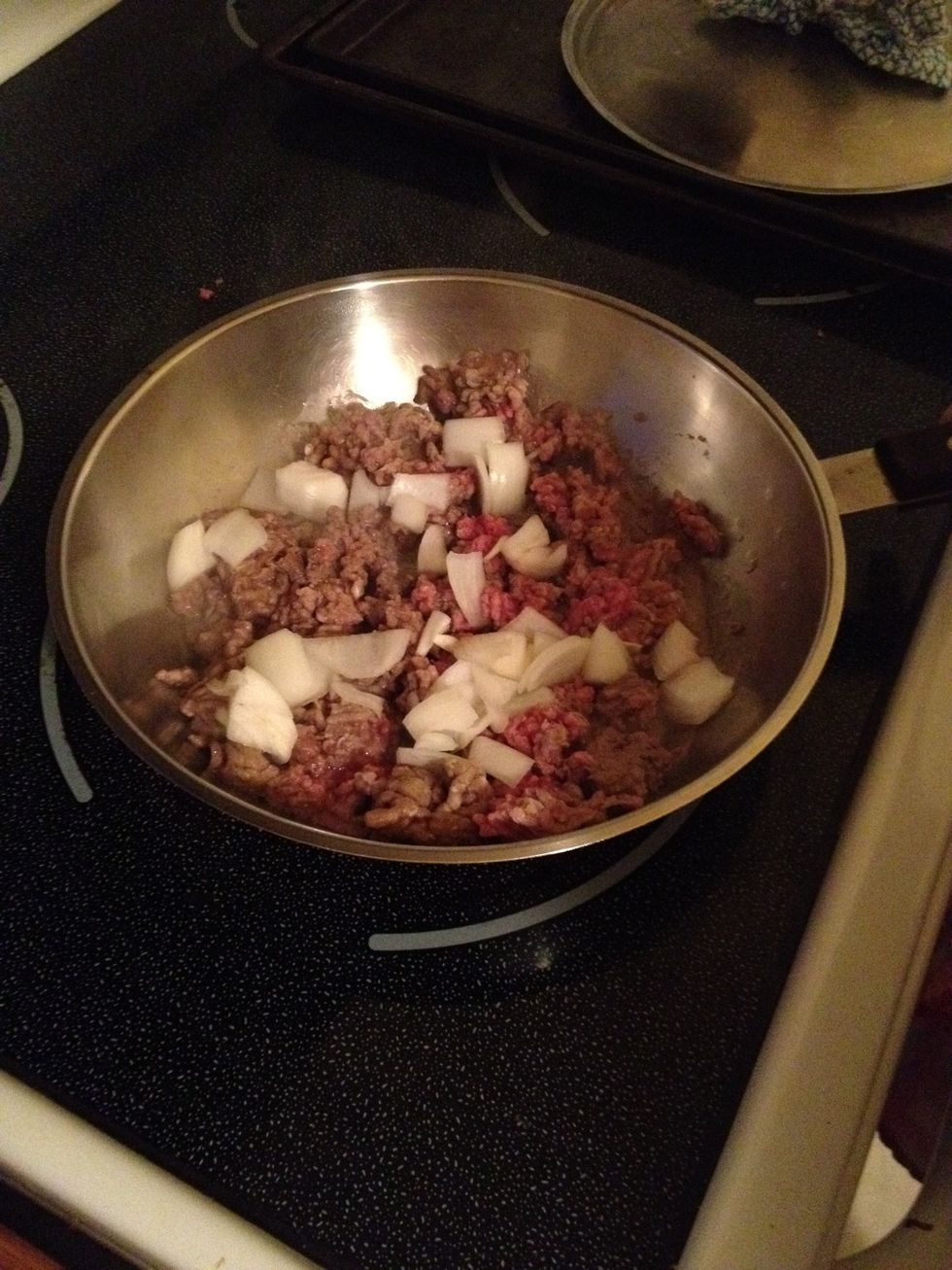 Add onions after the meat is all brown