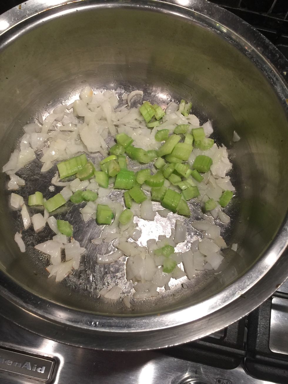 Add onions and celery over medium high heat to soften.