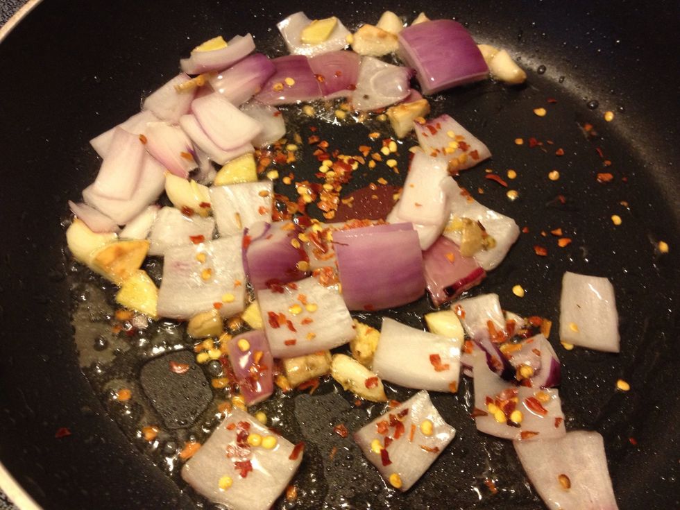 Add onions and flakes; saut\u00e9 until onions turn a translucent pink.