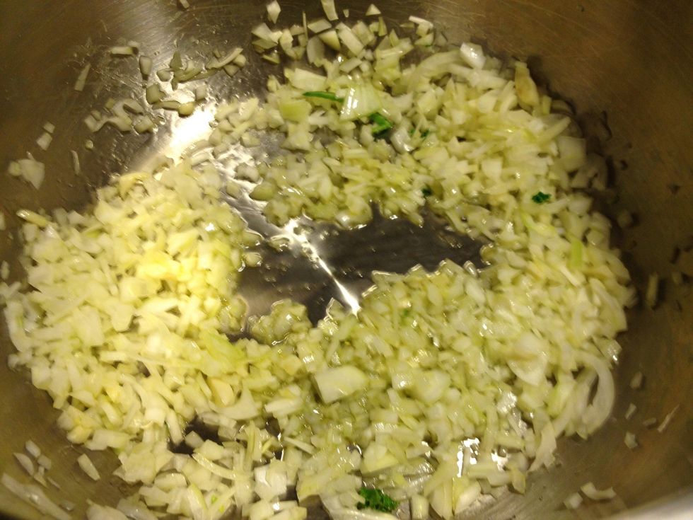 Add onions and garlic.