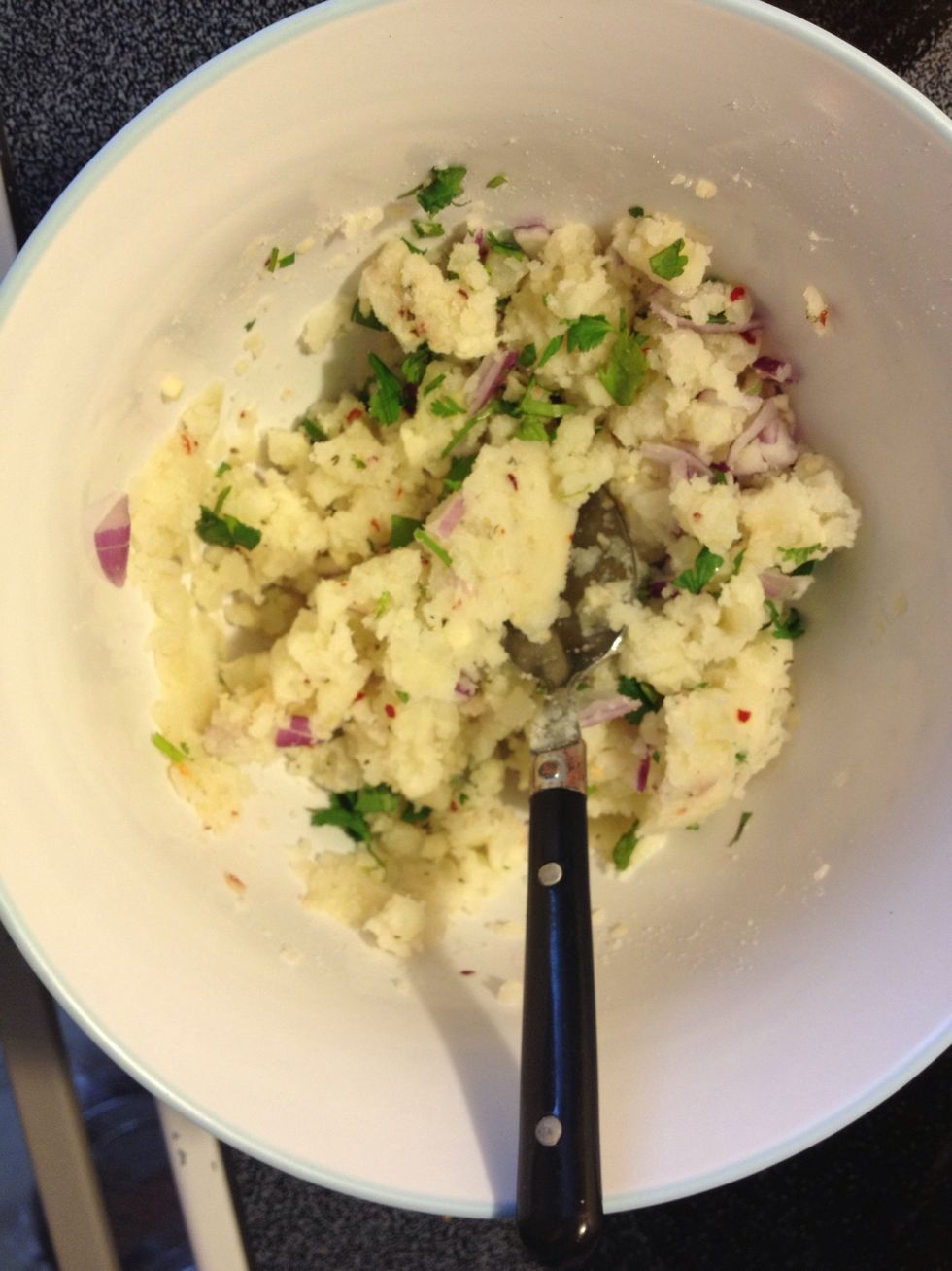 Add onions, cilantro and garlic and mix