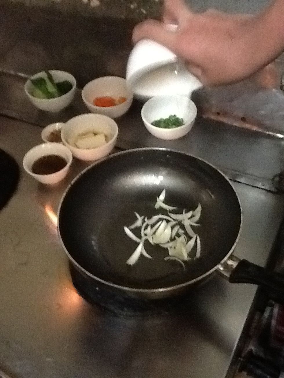 Add onions into the pan