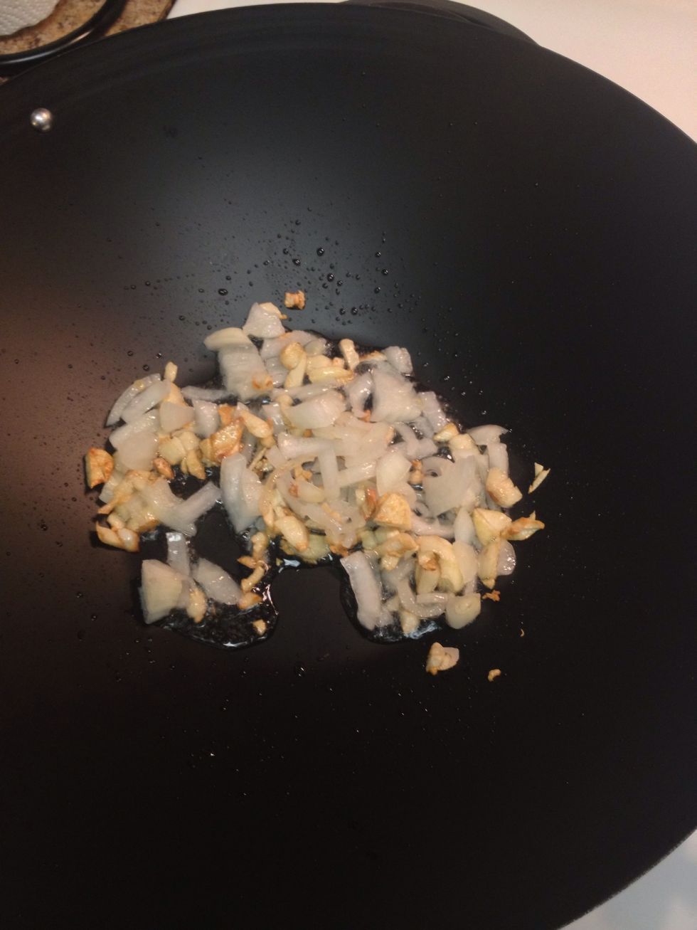 Add onions when your garlic is done. And saut\u00e9. .