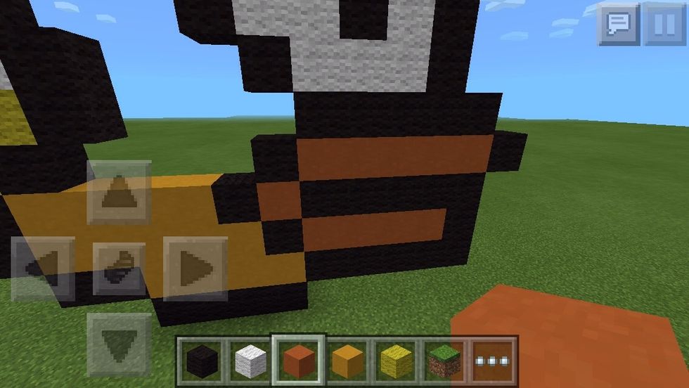 Add orange stained clay for the mouth.