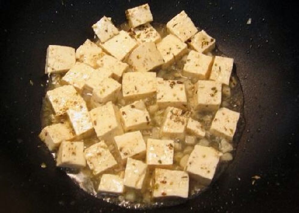 Add oregano, black pepper, and ginger, I add these visually to my taste, so do so accordingly for your own tastes. Increase heat to medium and saute for a couple minutes. 9