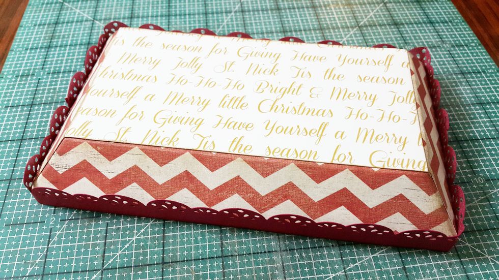 Add papers of the roof and add punched border to decorate, here you are alright to start decorating your Christmas shop.