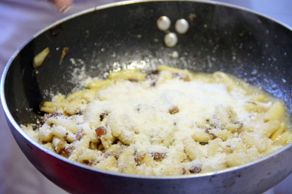 Add parmesan cheese...a nice sprinkle...we will be getting a nice sauce with it