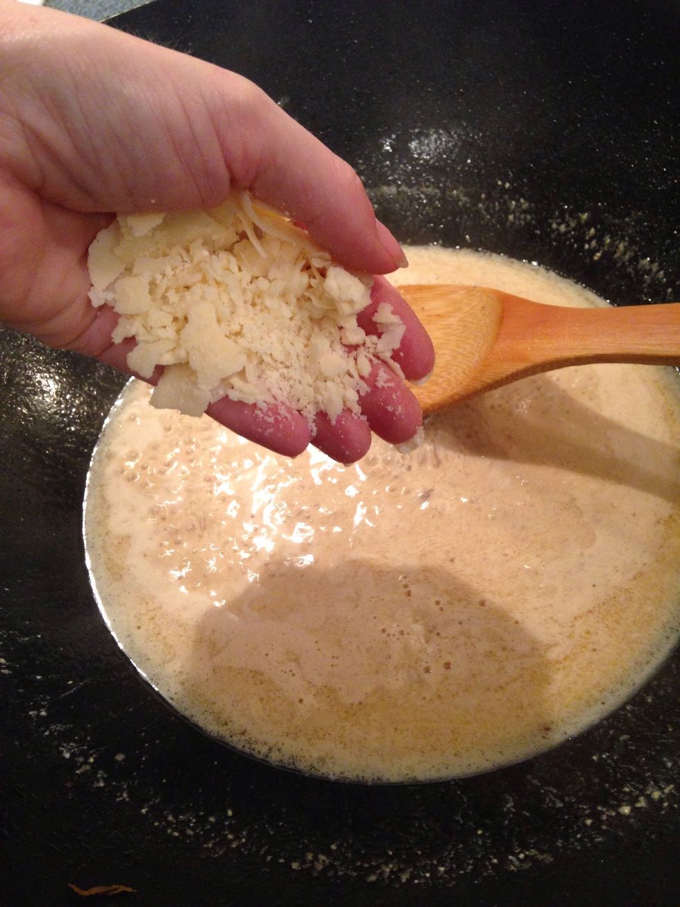 Add parmesan. I used about two large handfuls. Stir until cheese melts.